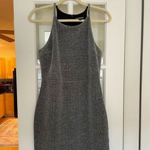 This is a dress I purchased in 2015 from Express. It is Metallic and Polyester.